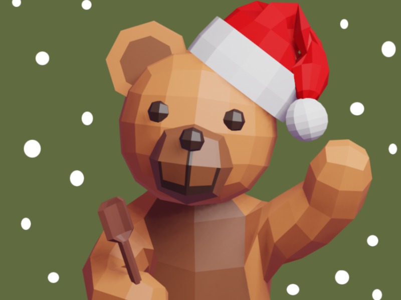 Billede af Bamse der vinker imens han har nissehue på.